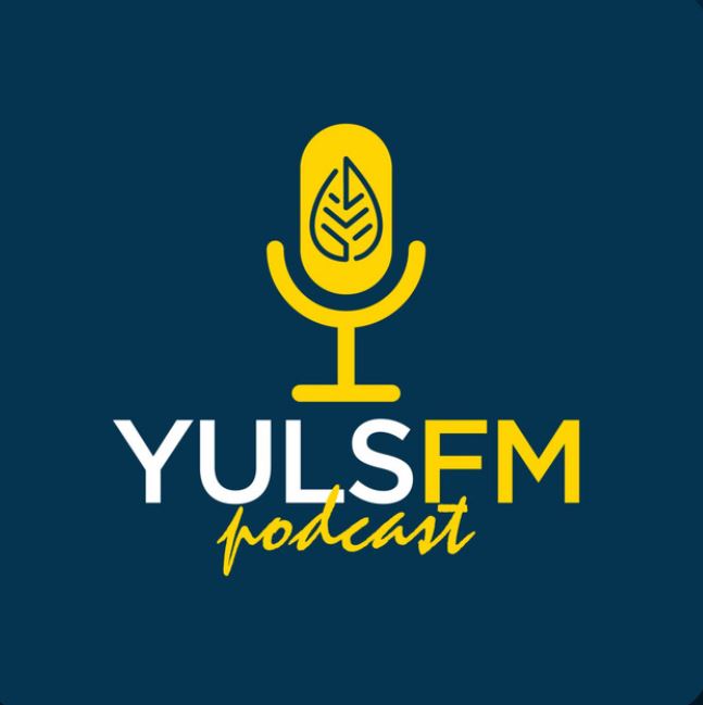 A screen with a microphone with text saying YulsFM podcast.